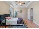 Spacious bedroom with a ceiling fan and ample floor space at 5441 Leighton Ln, Oviedo, FL 32765