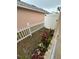 Small backyard with white fence and plants at 5453 Wood Crossing St, Orlando, FL 32811