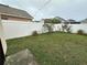 Fenced-in backyard with grassy area at 5453 Wood Crossing St, Orlando, FL 32811