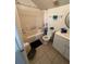 Clean bathroom with a tub, toilet, and vanity at 5453 Wood Crossing St, Orlando, FL 32811