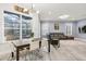 Kitchen dining area with hardwood floors and view to the backyard at 5590 Whispering Woods Pt, Sanford, FL 32771