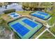 Community tennis courts with excellent condition at 5590 Whispering Woods Pt, Sanford, FL 32771