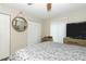 Bright bedroom with a large bed, TV, and ample closet space at 570 Orange Dr # 51, Altamonte Springs, FL 32701