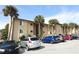 Exterior view of Sandy Cove Condominiums and parking at 570 Orange Dr # 51, Altamonte Springs, FL 32701