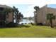 Condo community with water access and lush landscaping at 570 Orange Dr # 51, Altamonte Springs, FL 32701