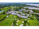 Aerial view of Bay Hill community amenities including a clubhouse and golf course at 5737 Masters Blvd, Orlando, FL 32819