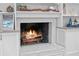 Brick fireplace with a white stone surround and built in shelving at 5737 Masters Blvd, Orlando, FL 32819