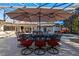 Patio with table and chairs near the pool at 5737 Masters Blvd, Orlando, FL 32819