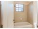 Bathroom with shower/tub combo and neutral tile at 8146 Prestbury Dr, Orlando, FL 32832