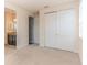 Bedroom with double door closet and access to bathroom at 8146 Prestbury Dr, Orlando, FL 32832