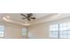 Bright bedroom with ceiling fan and multiple windows at 8146 Prestbury Dr, Orlando, FL 32832