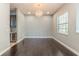 Formal dining room with hardwood floors and natural light at 8146 Prestbury Dr, Orlando, FL 32832