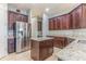 Kitchen with stainless steel appliances and granite countertops at 8146 Prestbury Dr, Orlando, FL 32832