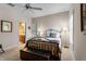 Spacious bedroom with a metal bed frame and plenty of natural light at 8312 Via Rosa, Orlando, FL 32836