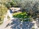 Aerial view showing house, landscaping, and driveway at 846 Leopard Trl, Winter Springs, FL 32708