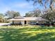 Charming ranch-style home with stone accents and manicured lawn at 846 Leopard Trl, Winter Springs, FL 32708