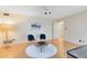 Living room with hardwood floors, two blue chairs, and a coffee table at 846 Leopard Trl, Winter Springs, FL 32708