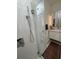 Bathroom featuring glass shower doors, modern shower head, and vanity with sink at 860 N Orange Ave # 163, Orlando, FL 32801