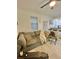 Cozy living room featuring comfortable seating and neutral decor at 860 N Orange Ave # 163, Orlando, FL 32801