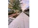 Wide sidewalk lined with trees and landscaping, perfect for a leisurely stroll at 860 N Orange Ave # 163, Orlando, FL 32801