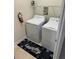 Laundry room with washer, dryer, and shelving at 8973 Azalea Sands Ln # 8973, Davenport, FL 33896