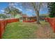 Large backyard with wooden deck, fenced, and a pool at 926 Freshmeadow Ct, Apopka, FL 32703