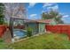 Inviting backyard oasis featuring a screened-in pool and spacious deck at 926 Freshmeadow Ct, Apopka, FL 32703