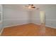 Bedroom with hardwood floors and ceiling fan at 926 Freshmeadow Ct, Apopka, FL 32703