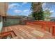 Wooden deck with stairs leading to the backyard and screened enclosure at 926 Freshmeadow Ct, Apopka, FL 32703