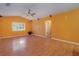 Bright living room with hardwood floors and high ceilings at 926 Freshmeadow Ct, Apopka, FL 32703