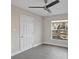 Well-lit bedroom featuring a window and tile floors at 1016 W Lake Marion Rd, Haines City, FL 33844