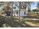 Side view of the home showcasing the exterior at 1016 W Lake Marion Rd, Haines City, FL 33844