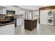 Modern kitchen with butcher block island and stainless steel appliances at 1016 W Lake Marion Rd, Haines City, FL 33844