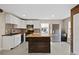 Modern kitchen with butcher block island and stainless steel appliances at 1016 W Lake Marion Rd, Haines City, FL 33844