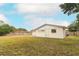 View of the house from the backyard at 102 Carriage Hill Dr, Casselberry, FL 32707