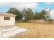 Large backyard with wooden privacy fence at 102 Carriage Hill Dr, Casselberry, FL 32707