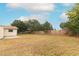 Large backyard with wooden privacy fence at 102 Carriage Hill Dr, Casselberry, FL 32707