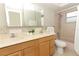 Clean bathroom with double vanity, tiled shower, and bathtub at 102 Carriage Hill Dr, Casselberry, FL 32707