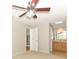 Spacious bedroom with ceiling fan and carpeting at 102 Carriage Hill Dr, Casselberry, FL 32707