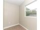 Small bedroom with tile floors and a window at 102 Carriage Hill Dr, Casselberry, FL 32707