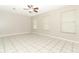 Simple bedroom with tile floors and multiple windows at 102 Carriage Hill Dr, Casselberry, FL 32707