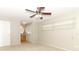 Bright bedroom featuring a ceiling fan and window blinds at 102 Carriage Hill Dr, Casselberry, FL 32707