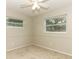 Bright bedroom with neutral carpeting and ceiling fan at 102 Carriage Hill Dr, Casselberry, FL 32707