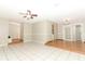 Open living space with tile and hardwood floors at 102 Carriage Hill Dr, Casselberry, FL 32707