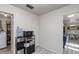 Laundry room with washer, dryer, and storage shelving at 1074 Gerona Ave, Deltona, FL 32725