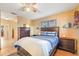 Bedroom with double bed, dresser, and access to hallway at 1098 Soria Ave, Orlando, FL 32807