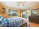 Main bedroom with sliding door access to a private patio at 1098 Soria Ave, Orlando, FL 32807