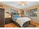 Spacious bedroom with a double bed and plenty of natural light at 1098 Soria Ave, Orlando, FL 32807