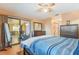 Main bedroom with sliding door access to a private patio at 1098 Soria Ave, Orlando, FL 32807