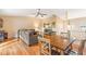 Cozy dining area with wood table and chairs, adjacent to living room at 1098 Soria Ave, Orlando, FL 32807